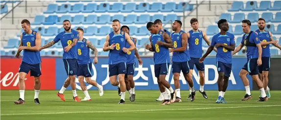  ?? Martin Rickett/PA ?? England’s Kyle Walker, second left and who is recovering from injury, during yesterday’s training session at the Al Wakrah Sports Club