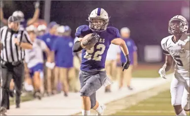  ?? Steven Eckhoff, File ?? Darlington’s Thomas Speed charges down the sideline on a 41-yard screen pass touchdown during the Tigers’ game against St. Francis. Speed picked off a pass during the Tigers’ game at Christian Heritage.