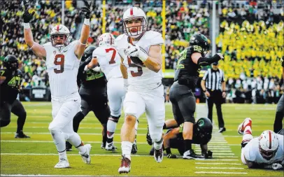  ?? THOMAS BOYD/ THE ASSOCIATED PRESS ?? Stanford running back Christian McCaffrey runs for a touchdown against Oregon on Nov 12. McCaffrey sat out the Sun Bowl to protect his draft stock, and curious team have asked him about that decision during the NFL scouting combine this week at...
