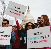  ?? J. Scott Applewhite/Associated Press ?? Devotees of TikTok gather at the Capitol in Washington, as the House passed a bill that would lead to a nationwide ban of the app if its China-based owner doesn't sell, Wednesday, March 13.