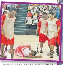  ?? Jesus played by Enosi Kacavou (on floor) whipped by the soldiers during the Easter drama church service at the Christian Mission Fellowship, World Harvest Centre. Picture: FT FILE ??
