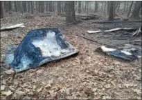  ?? PHOTO PROVIDED ?? Charred rubble is all that remains of a storage shed where Operation Adopt A Soldier stored equipment for its annual Haunted Hayride. A Sunday night fire is considered suspicious in nature.