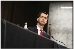  ?? (AP/The Washington Post/Demetrius Freeman) ?? Sen. Tom Cotton makes his first appearance as a member of the Senate Judiciary Committee on Monday during the confirmati­on hearing for Merrick Garland, the nominee for attorney general.