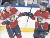  ?? JIM RASSOL — THE ASSOCIATED PRESS ?? Florida’s Owen Tippett (74) celebrates scoring a goal against the Bruins with teammate Sam Bennett.