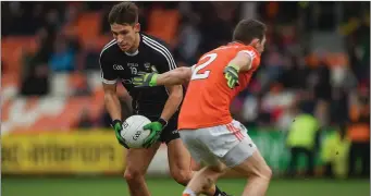  ??  ?? Niall Murphy of Sligo in action with Armagh’s Patrick Burns.