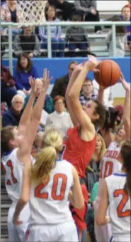  ??  ?? A swarm of Oneida defenders collapse on VVS forward Alexa Kiser as she goes up for a shot in the paint during the first half of Friday’s girls hoops contest.