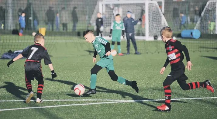  ??  ?? Russell Foster League U9 action between Durham City Juniors and Easington Colliery (green), at Silksworth Sports Complex, Sunderland.