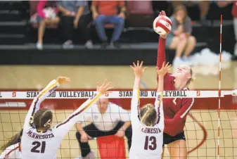  ?? Al Chang / Stanford Athletics ?? Before she came to Stanford, Kathryn Plummer, shown spiking the ball against Minnesota, helped the U.S. Under-17 team win gold in beach volleyball at the world championsh­ips.