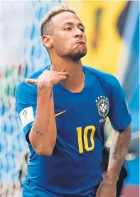  ?? Pictures: AP/Getty. ?? Top left: Philippe Coutinho scores Brazil’s first goal; top: Costa Rica keeper Keylor Navas gets in a tangle with Casemiro; above: Neymar celebrates making it 2-0.