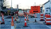  ?? MARSHALL GORBY / STAFF ?? The work continues Wednesday on Broad Street in Fairborn. This project is among those funded with a 10-year, 0.25% income tax levy the city is seeking to renew next year.