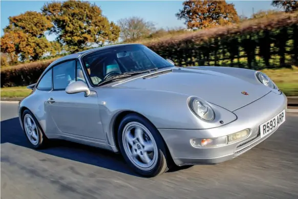  ??  ?? 993 Targa ticks all the boxes, mixing the 911’s coupe shape with a sliding glass roof. Plus, of course, it’s the last of the aircooled 911s