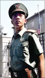  ?? FREDERIC BROWN/AFP ?? A guard is pictured outside the US Embassy in China in 2001.