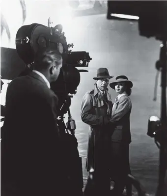  ??  ?? Michael Curtiz directing Humphrey Bogart and Ingrid Bergman on the set of Casablanca, 1942