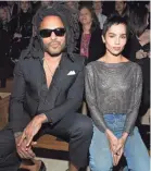  ?? PASCAL LE SEGRETAIN/GETTY IMAGES ?? Lenny Kravitz, left, and daughter Zoe Kravitz at a Paris Fashion Week event in February.
