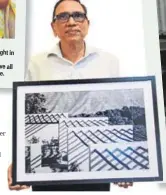  ??  ?? Jagdish Agarwal, founder of the Dinodia archive, with one of his own photos, shot in Mahabalesh­war in 1985. BHUSHAN KOYANDE/HT