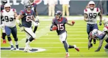  ?? MATT PATTERSON/AP ?? Texans wide receiver Will Fuller V (15) carries the ball after a reception against the Patriots on Nov. 22 in Houston.