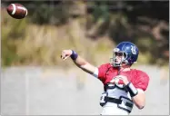  ?? RICK RYCROFT ?? U.S. college Rice’s football player Sam Glaesmann throws a ball as his team trains ahead of the season opening game against Stanford in Sydney, Thursday. The game will be played on Sunday.