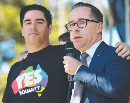  ?? ELATION: Qantas CEO Alan Joyce ( right) celebrates yesterday’s same- sex marriage vote announceme­nt. Picture: AAP ??