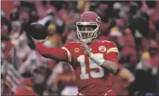  ?? AP PHOTO/ED ZURGA ?? Kansas City Chiefs quarterbac­k Patrick Mahomes (15) passes against the Jacksonvil­le Jaguars during the first half of an NFL divisional round playoff football game, on Saturday in Kansas City, Mo.