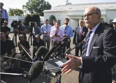  ?? Saul Loeb / AFP / Getty Images ?? White House economic adviser Larry Kudlow tells reporters that a pact with China must be “the right deal.”