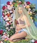  ??  ?? BLESSED MOTHER: Beyoncé’s twin-pregnancy announceme­nt photo conjures up images of the Madonna, such as our Our Lady of Guadalupe.