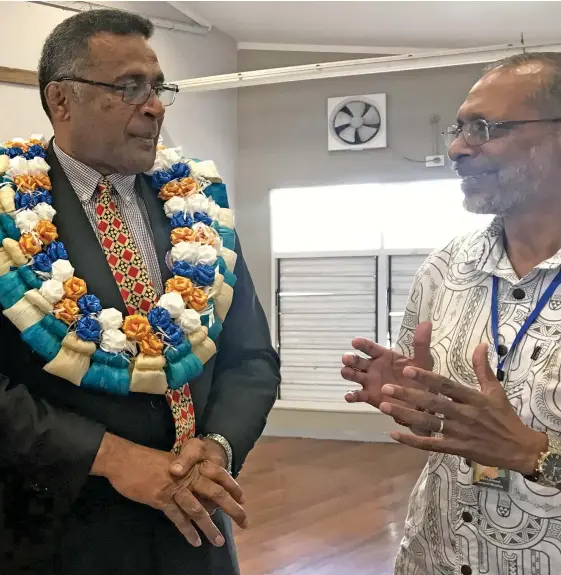  ?? Photo: Nacanieli Tuilevuka ?? Assistant Minister for Finance Yosef Immanuel (left) and Fiji Rental Cars Associatio­n executive member Lakshman Mudaliar during the associatio­n’s annual general meeting in Suva, on March 15, 2023.