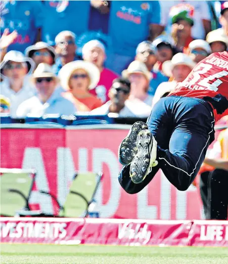  ??  ?? Wonder catch: Chris Jordan dismisses India’s KL Rahul and celebrates (right)