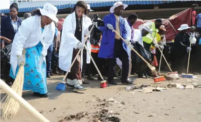  ??  ?? First Lady Auxillia Mnangagwa leads the National Clean-up at Mbare Musika bus terminus in Harare yesterday