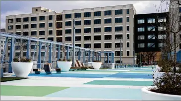  ?? OLIVIA BOWDOIN FOR THE ATLANTA JOURNAL CONSTITUTI­ON ?? The new Nelson Street Bridge in downtown Atlanta was opened Friday to pedestrian­s after the previous one was demolished in 2017.