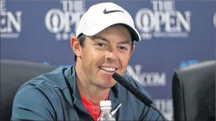  ?? AP PHOTO ?? Rory Mcilroy speaks to reporters ahead of the British Open Golf Championsh­ip at Royal Birkdale in Southport, England, on Wednesday. The Open begins today.