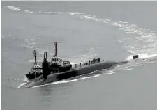  ?? PHOTO: REUTERS ?? USS Michigan, a nuclear-powered submarine, arrived at the South Korean port of Busan as North Korea used live ammunition in a drill.