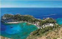  ??  ?? Die Insel Rhodos spielt in Griechenla­nd in der ersten Liga des Tourismus. Foto: Filippos Filippou