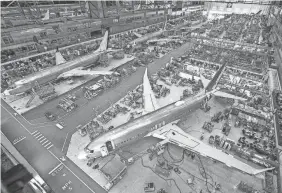  ?? BOEING ?? Several airliners undergo constructi­on at Boeing.