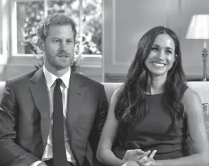  ??  ?? In this photo taken from video, Britain’s Prince Harry and Meghan Markle talk about their engagement Monday during an interview in London. It was announced Monday that Prince Harry, fifth in line for the British throne, will marry American actress...