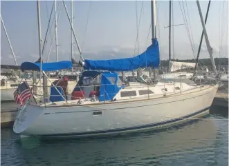  ?? ?? TOP:
Cal 33 fiberglass sailboat.