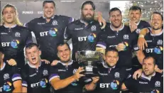  ??  ?? The Scotland squad celebrate after beating Argentina 44-15 in the final match of their Summer tour at the Estadio Centenario in Resistenci­a