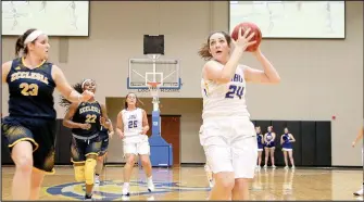  ?? Photo courtesy of JBU Sports Informatio­n ?? John Brown junior forward Baily Cameron, a Siloam Springs native, is coming off a strong sophomore season in which she led the Golden Eagles in scoring at 17.5 points and rebounding at 7.0 boards per game. She was named to the Sooner Athletic...