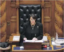  ?? THE CANADIAN PRESS ?? Lt.-Gov. Janet Austin delivers the throne speech at the legislatur­e on Monday.