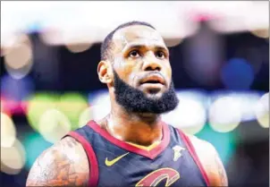  ?? AFP ?? NBA superstar LeBron James is to leave the Cleveland Cavaliers and join Magic Johnson and the LA Lakers in a four-year deal, his agents have said.