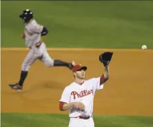  ?? Rob Carr / Associated Press ?? Cody Ross rounds the bases after hitting one of his two homers off Roy Halladay in Game 1 of the 2010 NLCS.