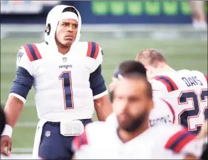  ?? Abbie Parr / TNS ?? Patriots quarterbac­k Cam Newton looks on before a game against the Seahawks earlier this season.