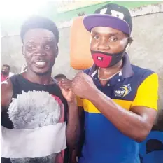  ??  ?? Nigeria’s Joe Boy ( right) with Anna Doste set for the CBC title fight in Accra, today