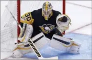  ?? GENE J. PUSKAR — THE ASSOCIATED PRESS ?? Penguins goalie Matt Murray makes a save against the Blue Jackets in Pittsburgh on Saturday.
