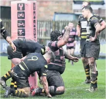  ??  ?? All action
Man of the match Ben Cree dives over for one of his two tries, left, and Zac Howard goes on the charge, right