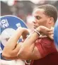  ?? JEFF BLAKE The State ?? South Carolina Gamecocks running back MarShawn Lloyd lifts weights during a workout. Weightlift­ers have to watch out for an injury to the pectoralis major muscle.