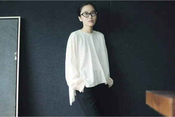  ??  ?? Chinese fashion designer Min Liu’s simple yet sophistica­ted designs have received critical acclaim and demand internatio­nally. “I think clothes need to be easy and practical,” she says.