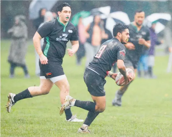  ?? Photo / Warren Buckland ?? Tamatea halfback Ash Robinson makes a break during his team’s 22-5 win against Otane in Saturday’s promotion-relegation match.