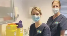  ??  ?? A GP and nurse preparing the vaccine at Pulborough Medical Group