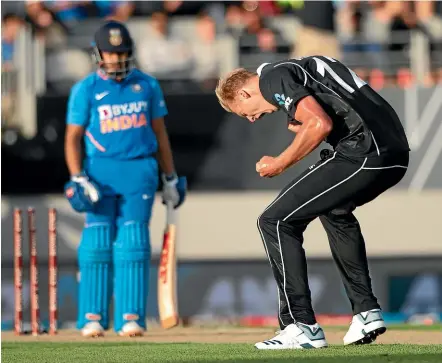  ?? PHOTOSPORT ?? Black Caps seamer Kyle Jamieson celebrates capturing the wicket of India’s Prithvi Shaw during his ODI debut at Eden Park in Auckland.