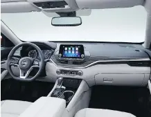  ??  ?? The Altima’s interior is roomy and comfortabl­e with ample legroom.